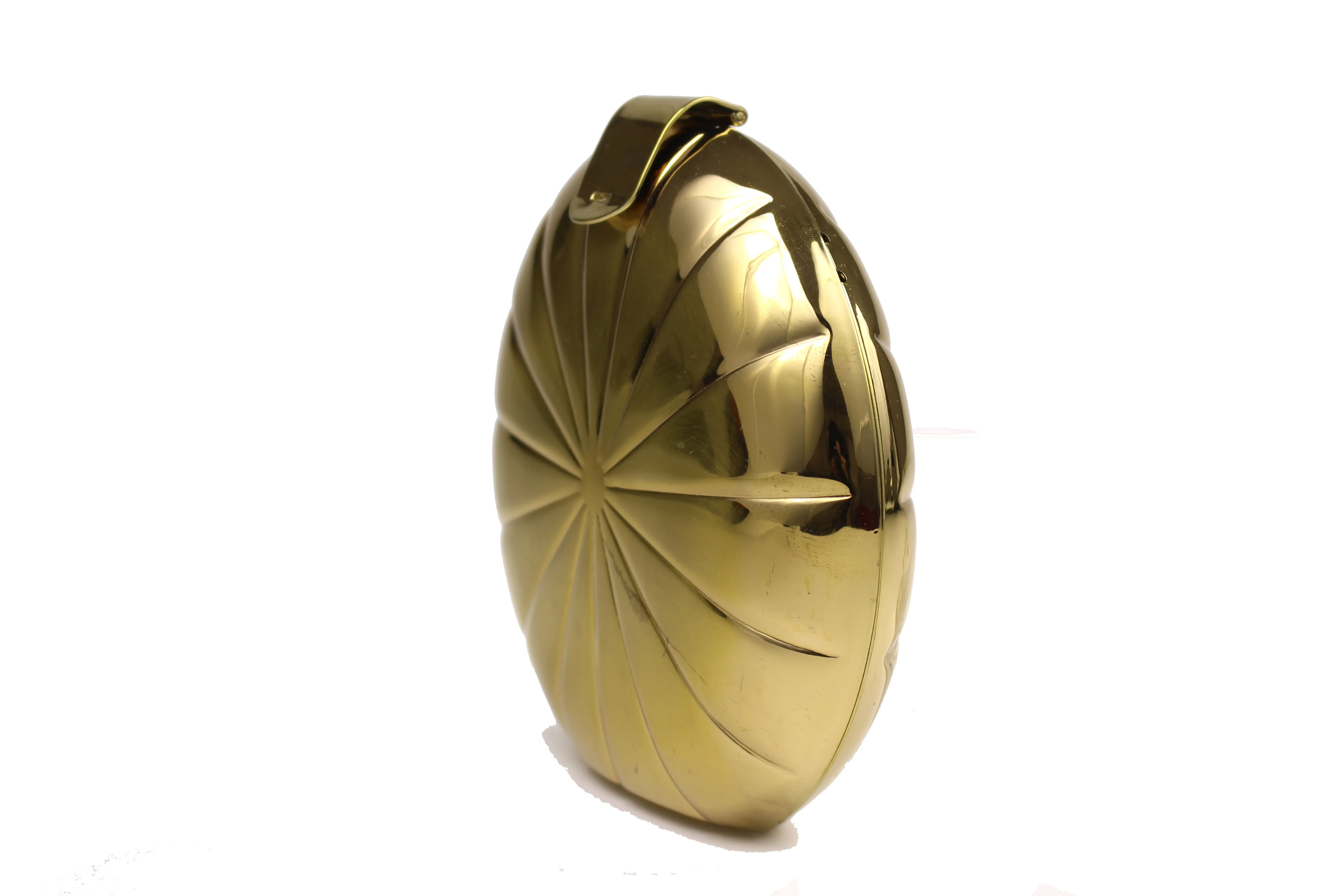 Metallic gold circular clutch with radial embossing